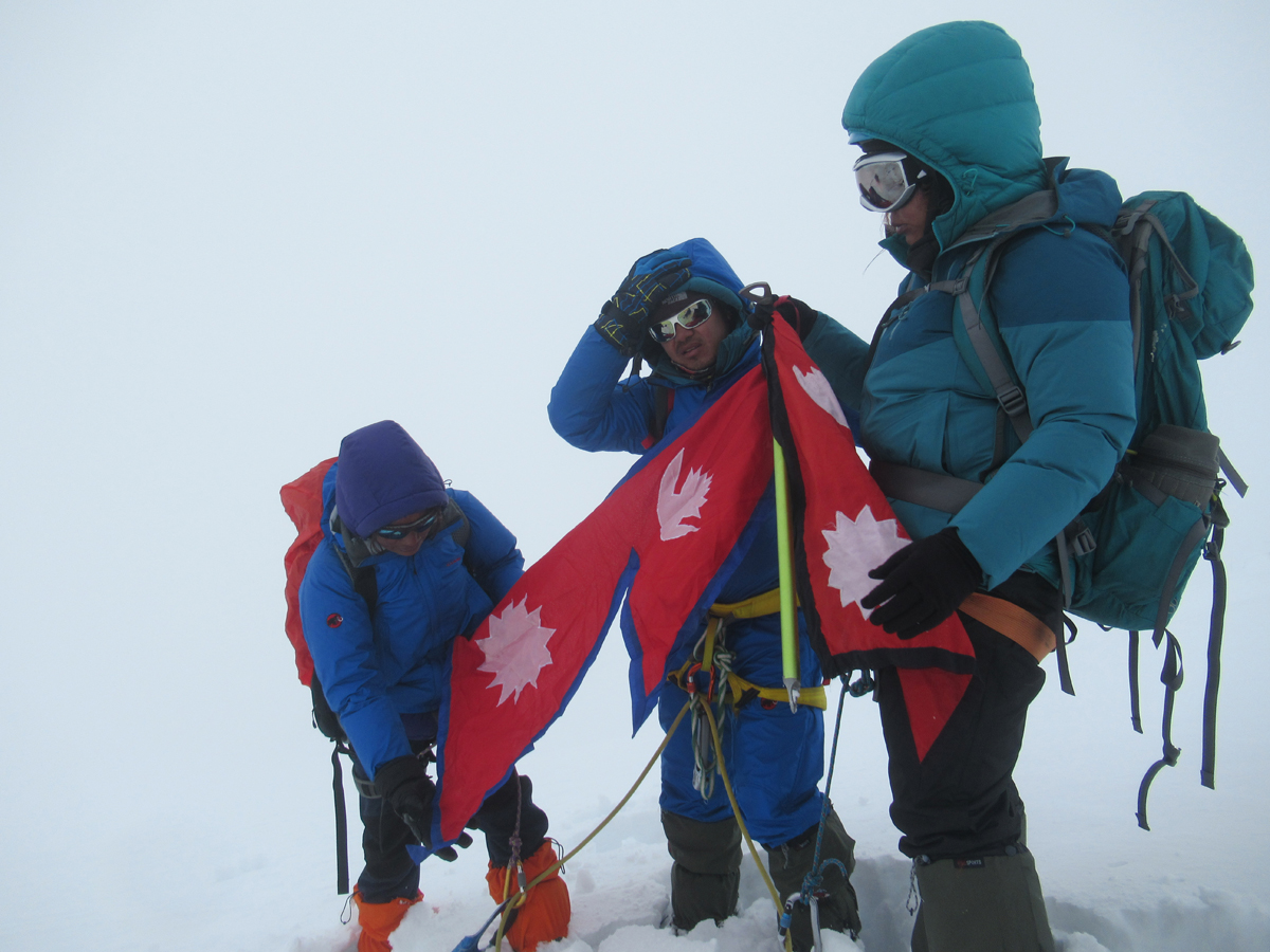 Climbers including Maya Gurung on The top of Jugal Peak